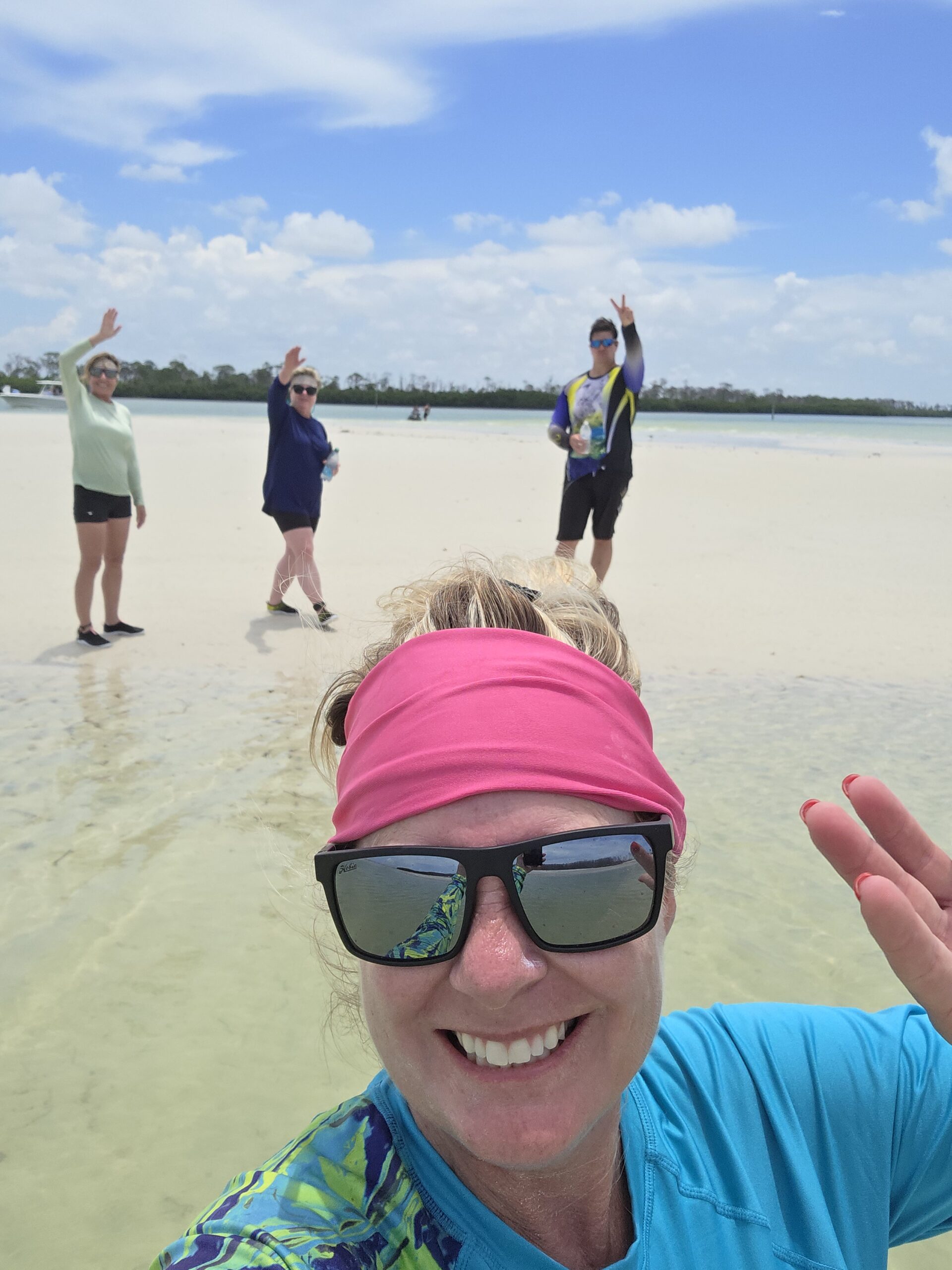 Guests exploring a secluded Gulf Coast barrier island on a private island hopping charter near Clearwater Florida
