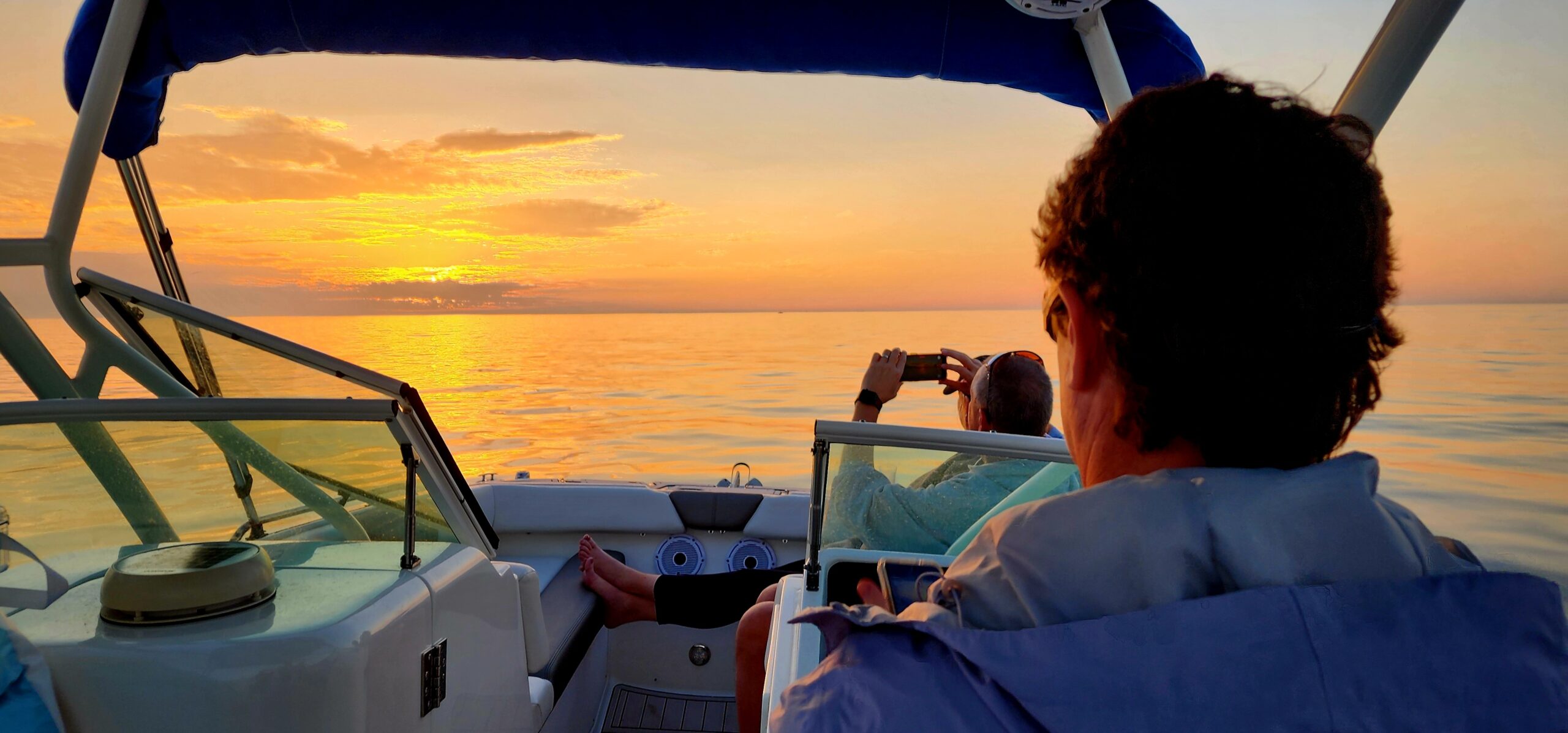 Couple enjoying a private sunset cruise on the Gulf of Mexico near Clearwater and St. Petersburg Florida