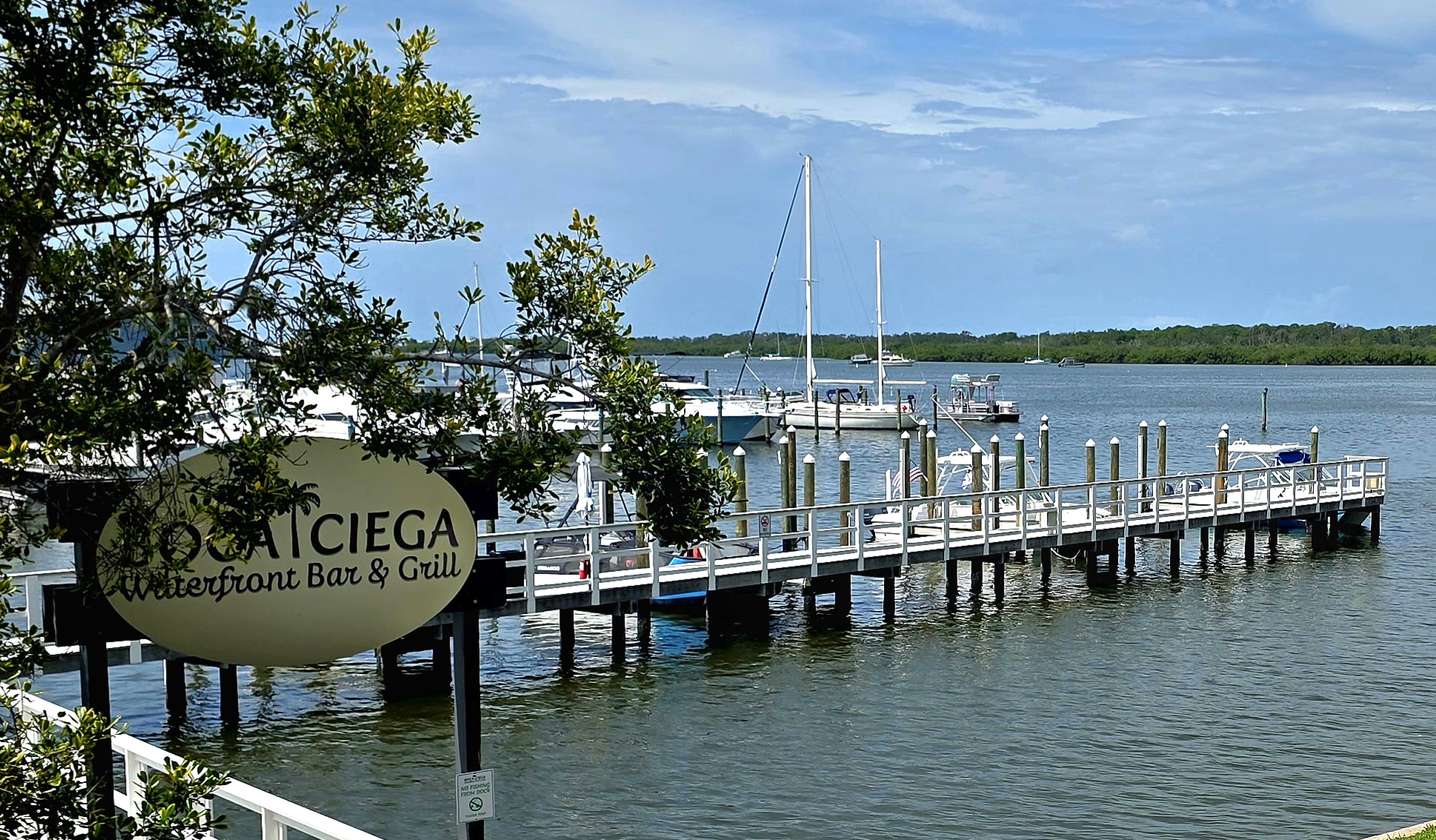 The dock and nine boat slips at Boca Ciega Waterfront Bar and Grill on Boca Ciega Bay near Madeira Beach, Florida