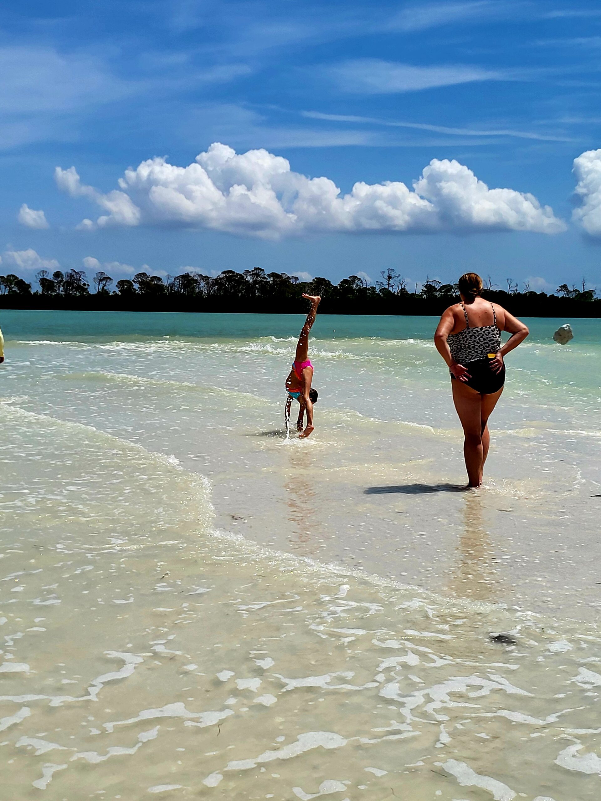 Guests floating on the Sunchill at a shallow Gulf Coast sandbar near Clearwater, Florida